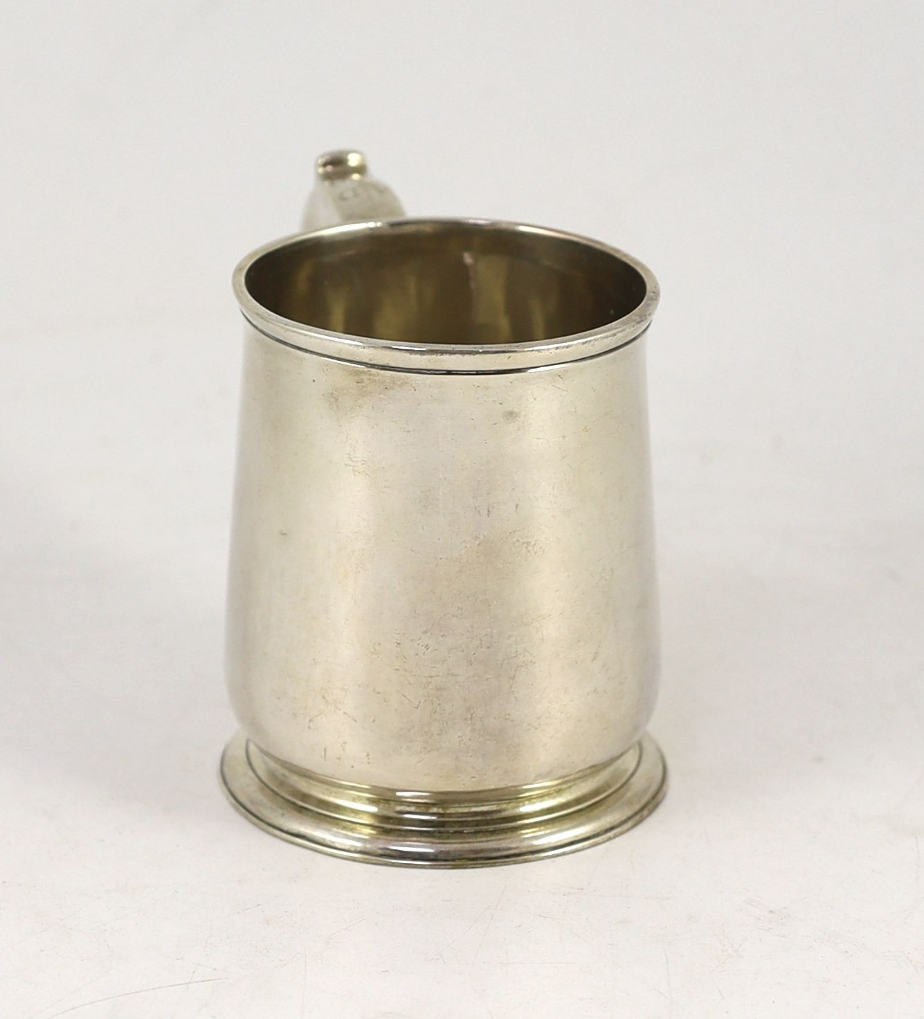An early George II silver mug, London by Robert Lucas